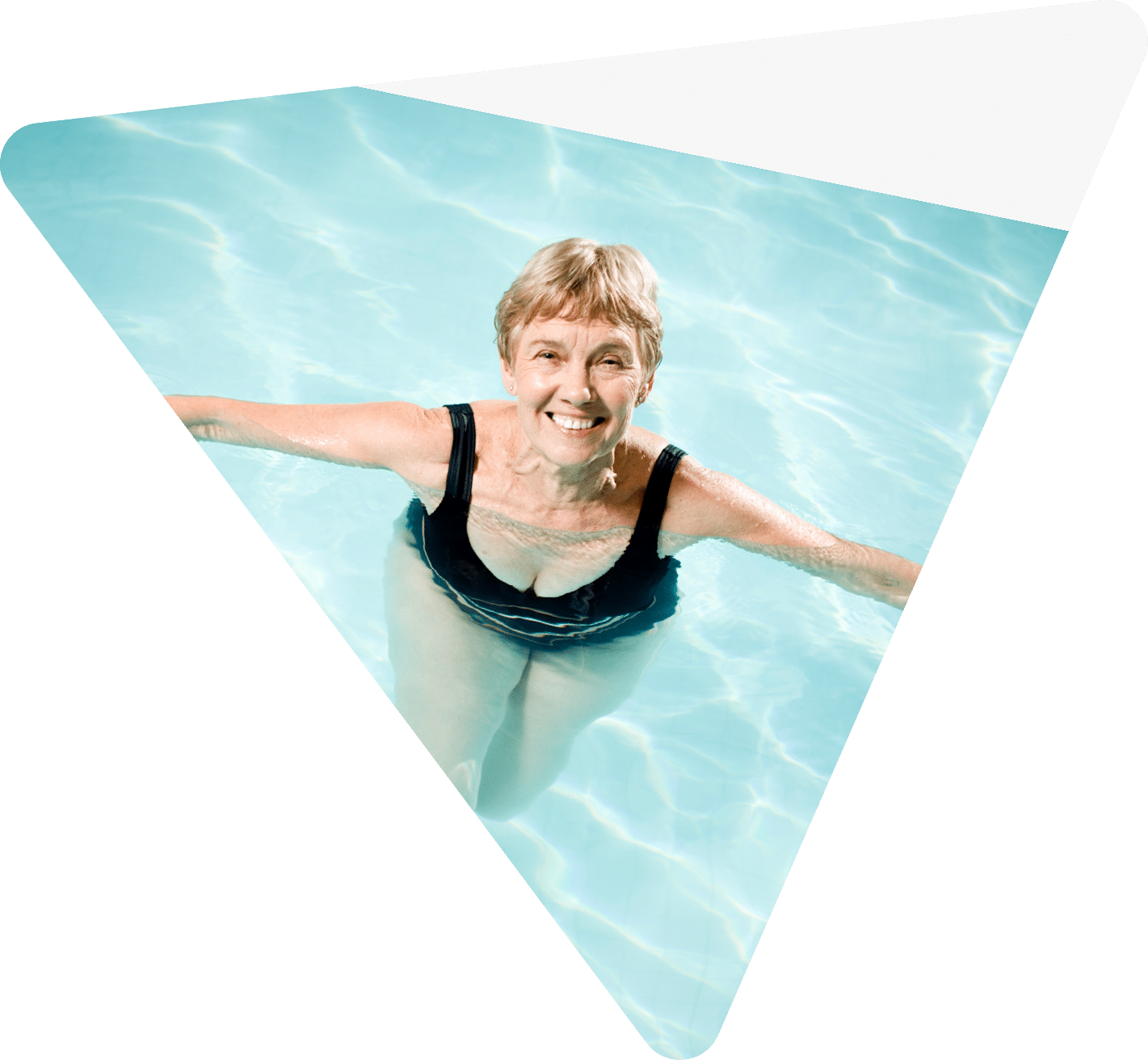 A beautiful senior women aquasizing with foam water weights. A very low impact way of exercising.
