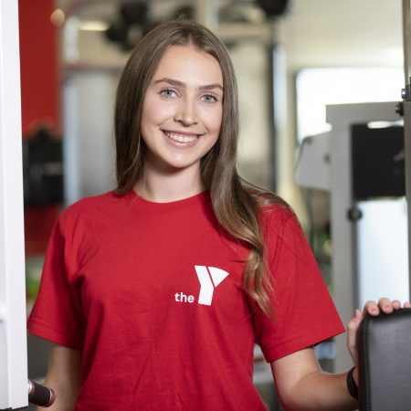 Smiling staff member in the gym